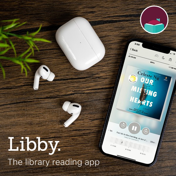 ListenLibby_1080x1080-0323.jpg A phone with the libby app open to an audiobook on a table with earbuds